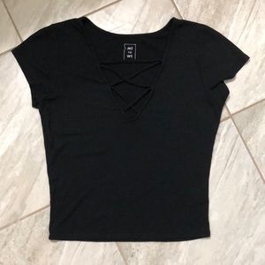 black criss-crossed slightly cropped top
